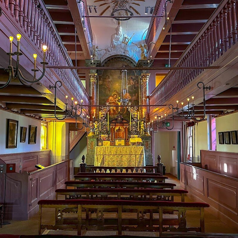 Ons' Lieve Heer op Solder (Our Lord in the Attic Museum) - Step into a real-life secret as you explore **Ons’ Lieve Heer op Solder (Our Lord in the Attic Museum)**—a beautifully preserved 17th-century canal house hiding a full Catholic church in its attic. This hidden gem tells the story of Amsterdam’s remarkable religious tolerance: at a time when public Catholic worship was banned, ingenious locals created “house churches” like this one, where faith could quietly flourish behind closed doors. Perfect for families and curious travelers, your visit winds through narrow corridors, steep staircases, and authentically furnished rooms—bedrooms, kitchens, and living spaces—culminating in the awe-inspiring attic sanctuary. The church, built by merchant Jan Hartman in 1663, is a stunning surprise, complete with ornate décor and space for 150 worshippers. Interactive audio tours and special activities for children bring the house and its stories to life, making history engaging for all ages. Along the way, you’ll discover period artifacts, Dutch furniture, and fascinating glimpses into daily life centuries ago. Ons’ Lieve Heer op Solder isn’t just a museum—it’s a time capsule, offering an unforgettable, hands-on encounter with Amsterdam’s spirit of resilience and openness.