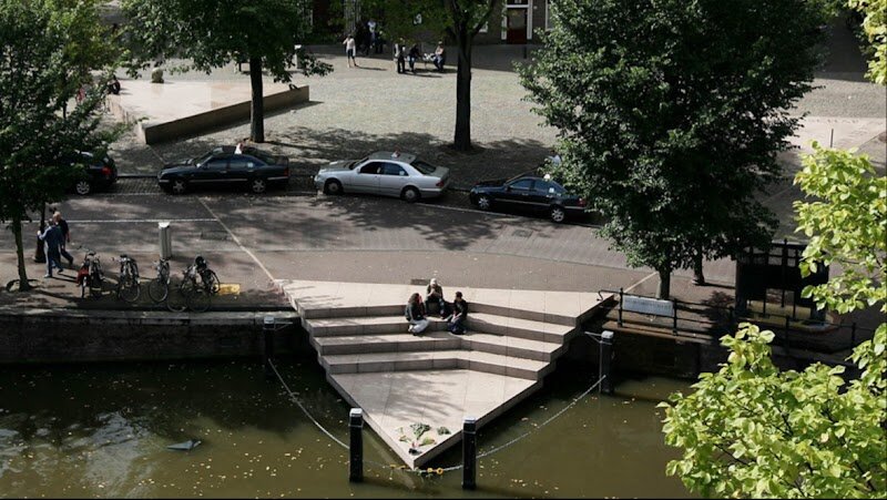 Homomonument - The **Homomonument** in Amsterdam stands as a powerful and moving tribute at the heart of the city, inviting visitors of all ages to reflect on the triumphs and struggles of the LGBTQ+ community. Opened in 1987, it is the world’s first memorial dedicated to gay men and lesbians persecuted not only during the Nazi regime but throughout history and across the globe. What makes this place truly special is its unique design: three large pink granite triangles embedded in the pavement, each pointing to a symbol of the past, present, and future—Anne Frank House, Dam Square, and the city’s LGBTQ+ center (COC). Families and curious travelers will find the Homomonument both thought-provoking and welcoming. Children can safely explore the gentle slopes of the granite triangles, while adults can reflect on stories of courage, solidarity, and resilience. The monument’s open, accessible design encourages visitors to gather, remember, or simply enjoy a quiet moment by the canal. Every year, ceremonies and celebrations animate the site, transforming it into a living symbol of pride and remembrance. A visit here offers not only a lesson in history but also a celebration of diversity and the enduring spirit of Amsterdam.