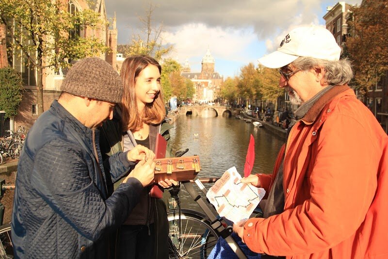 Mystery City Games - Step into the enchanting streets of Amsterdam and become a detective for a day with **Mystery City Games**—where adventure, history, and clever puzzles collide. Perfect for families and inquisitive travelers, this unique experience transforms the city into an immersive outdoor escape game and treasure hunt, blending the thrill of a scavenger hunt with the intrigue of a real-life mystery. As you follow treasure maps through Amsterdam’s iconic canals and hidden alleyways, you’ll unravel fascinating secrets from the city’s storied past. Each game is rooted in true history: from tracking secret societies during the Golden Age to uncovering tales of the Dutch resistance in WWII, you’ll solve escape-room-style puzzles using clues hidden in the city’s architecture and monuments. It’s a hands-on history lesson that brings Amsterdam’s colorful stories vividly to life. Whether you’re racing against the clock or exploring at your own pace, Mystery City Games invites all ages to team up, crack codes, and unlock treasures—no screens required. It’s a playful, interactive way to make memories, discover hidden corners, and see Amsterdam as you never have before.