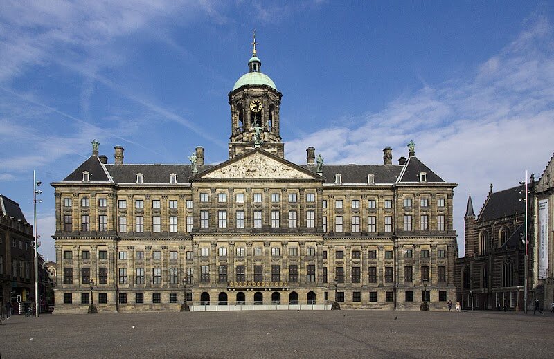 Royal Palace Amsterdam - The **Royal Palace Amsterdam** stands majestically on Dam Square, captivating visitors with its grand façade and rich history. Originally built in the 17th century as the city hall during the Dutch Golden Age, this iconic structure was once celebrated as the “eighth wonder of the world” for its scale and architectural brilliance. Designed by Jacob van Campen, the palace showcases **Dutch Classicism** and is supported by over 13,000 wooden piles—a testament to Amsterdam’s ingenuity. Families and curious travelers will be enchanted by the palace’s opulent interiors, where **mythical unicorns**, intricate sculptures, and masterpieces by artists like Rembrandt and Ferdinand Bol adorn the halls. Wander through the awe-inspiring **Great Hall** and **Throne Room**, experiencing firsthand the grandeur that once hosted kings, queens, and dignitaries. More than just a royal residence, this working palace is steeped in stories—from its transformation under King Louis Bonaparte, Napoleon’s brother, to its role in modern royal ceremonies. Today, the Royal Palace invites you to explore centuries of Dutch history, art, and civic pride, making it a must-see destination for anyone eager to discover Amsterdam’s royal heritage.