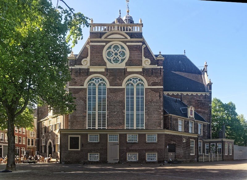 Noorderkerk - Noorderkerk, nestled in Amsterdam’s vibrant Jordaan district, is a hidden gem that invites families and curious travelers to step into the city’s rich past. Built between 1620 and 1623, this striking church was designed by renowned architect Hendrick de Keyser as a place for the neighborhood’s common folk, contrasting with the nearby Westerkerk’s grander clientele. Its unique architecture—a symmetrical Greek cross layout with four equal arms and a charming central tower—makes it stand out from the city’s other historic churches, reflecting both Renaissance ideals and the simplicity of Protestant design. Inside, visitors are greeted by impressive Tuscan pillars and a peaceful, light-filled space that feels both grand and welcoming. The church isn’t just a relic; it’s alive with music, hosting regular classical concerts that families can enjoy together. Outside, the lively Noordermarkt square bursts with energy, especially on market days, offering a true taste of local Amsterdam life. Whether you’re drawn by history, architecture, or the joy of discovery, Noorderkerk offers an inspiring blend of cultural heritage and community spirit.