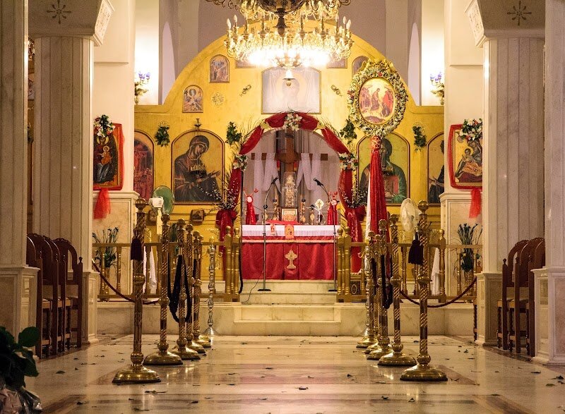 Ιερός Ναός Κοιμήσεως της Θεοτόκου - Nestled in the heart of Athens, the **Ιερός Ναός Κοιμήσεως της Θεοτόκου** (Church of the Dormition of the Virgin Mary) is a captivating destination for families and curious travelers eager to explore the city’s spiritual and architectural heritage. This historic church, also known as Panagia Chrysospiliotissa, traces its origins back to 1705, surviving wars and reconstructions to become a symbol of resilience and faith. What makes this church truly special is its harmonious blend of **Byzantine and neoclassical architecture**, a testament to the vision of renowned architects like Dimitrios Zezos and Ernst Ziller. Inside, visitors are greeted by ornate icons, intricate stonework, and a peaceful atmosphere that invites quiet reflection—making it a welcoming stop for all ages. Steeped in local legend and tradition, the church is renowned for its **miraculous icon of the Virgin Mary**, believed to bring comfort and protection, especially to families. Whether you’re marveling at the artistry, lighting a candle, or learning about its pivotal role during the Greek Revolution, the church offers a memorable glimpse into Athens’ living history and vibrant community spirit.