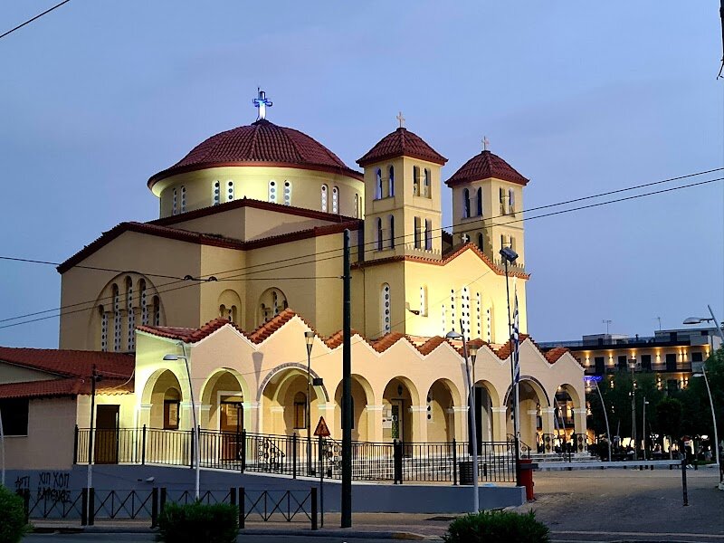 Μητροπολιτικός Ιερός Ναός Ευαγγελισμός της Θεοτόκου Περιστερίου - The Μητροπολιτικός Ιερός Ναός Ευαγγελισμός της Θεοτόκου Περιστερίου, or Metropolitan Cathedral of the Annunciation, stands as a beacon of faith and history in the heart of Athens. This awe-inspiring cathedral, with its magnificent blend of neoclassical and Byzantine architecture, was built using marble from 72 demolished churches, making it a living mosaic of Athens’ spiritual heritage. Construction began in 1842 and, after two decades of dedication and artistry by renowned architects and artists, the cathedral was completed in 1862. Families and curious travelers will find themselves immersed in stories of resilience and devotion. Inside, visitors can admire vibrant frescoes, grand marble columns, and the revered relics of Saints Philothei and Gregory V, both symbols of courage during turbulent times. The cathedral is not only a place for quiet reflection but also the stage for Greece’s most significant religious and national ceremonies, echoing with the spirit of independence and unity. A visit here is an invitation to experience living history, marvel at timeless artistry, and feel the pulse of Athens’ enduring faith and community.