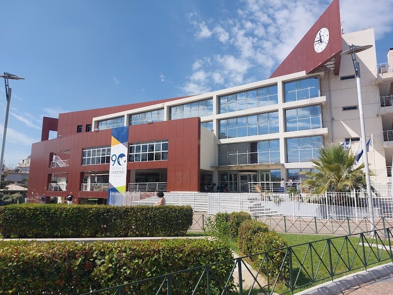 Town Hall of Peristeri - It seems there's a mix-up in your request. The Town Hall of Peristeri doesn't appear in the search results, which focus on the Athens Town Hall. However, I can guide you on how to craft a compelling description for a town hall in Athens, using the Athens Town Hall as an example, and then you can adapt it for Peristeri. --- **Discover the Athens Town Hall: A Neoclassical Gem** Tucked away on Athinas Street, the Athens Town Hall is a stunning example of neoclassical architecture, built in 1874. Originally a two-story building, it was expanded in 1937 to meet the growing needs of the city. This historic landmark is adorned with a marble propylon and a decorative balcony, making it a must-visit for architecture enthusiasts and families alike. Inside, visitors can explore vibrant paintings by renowned Greek artists and captivating murals depicting mythological themes. A highlight is the large oil painting of St. Paul teaching the Athenians, which adds a touch of history and culture to the space. The surrounding area, including Kotzia Square, offers additional attractions like the eclectic Melas Mansion. Whether you're a curious traveler or a family looking for a blend of history and beauty, the Athens Town Hall is a treasure to uncover. --- For Peristeri, you would need specific details about its town hall, but this format can be adapted to highlight its unique features and attractions.