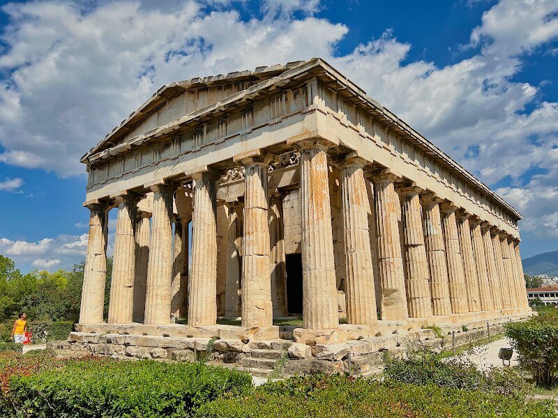 Temple of Hephaestus - Standing majestically in Athens' ancient Agora, the Temple of Hephaestus is a breathtaking journey back to the golden age of Classical Greece. Built around 449 BC during Athens' most prosperous era, this remarkable temple has earned the distinction of being **the best preserved ancient Greek temple in all of Greece**. What makes this place truly magical is its incredible state of preservation - you'll marvel at the original Doric columns, intricate marble carvings, and sculptural decorations that have survived over 2,500 years. The temple was dedicated to Hephaestus, god of blacksmiths and fire, reflecting the importance of craftsmanship in ancient Athenian society. Families will be captivated by the **stories carved in stone** - the eastern metopes depict the legendary Labors of Heracles, bringing ancient myths to life before your eyes. The temple's remarkable preservation comes from an fascinating twist: it was converted into a Christian church in the 7th century AD, which protected it through the ages. Constructed from gleaming **Pentelic marble** - the same material used for the Parthenon - this architectural masterpiece offers visitors an authentic glimpse into ancient Athens' religious and cultural heart.