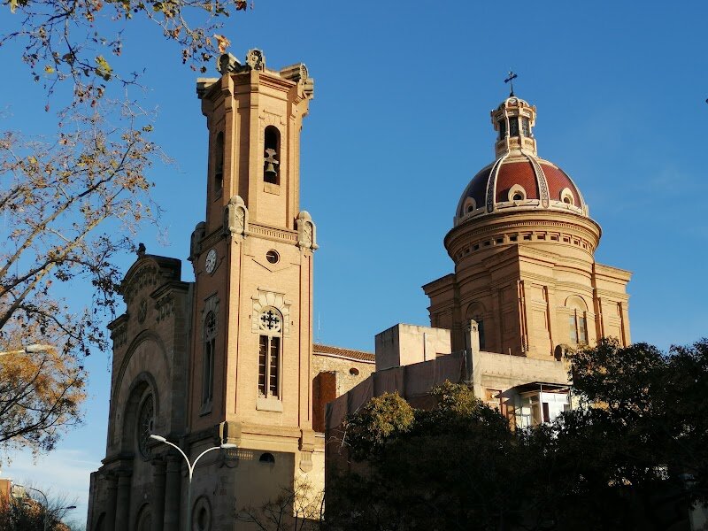 Parròquia de San Andreu de Palomar - Parròquia de San Andreu de Palomar stands as the historic heart of Barcelona’s Sant Andreu district, inviting families and curious travelers to step into a story that spans over a thousand years. This parish church, originally established in the 11th century, is surrounded by the charm of an old village that has preserved its unique identity even as it became part of Barcelona in 1897. What makes San Andreu de Palomar special is its vibrant community spirit and deep-rooted traditions. The neighborhood bursts into life during its annual *festa major*, when giant puppets, traditional dancers, and lively fire runs fill the streets—a spectacle that delights visitors of all ages and offers a genuine taste of Catalan culture. Inside and around the church, families can explore centuries-old architecture, stroll through picturesque squares, and enjoy the welcoming atmosphere of local shops and cafés. The area is ideal for anyone eager to experience authentic Barcelona, far from the crowds, where stories of farmers, artisans, and modern residents intertwine. A visit here is more than sightseeing—it’s a journey into Barcelona’s living history, making it a memorable stop for both adults and children alike.
