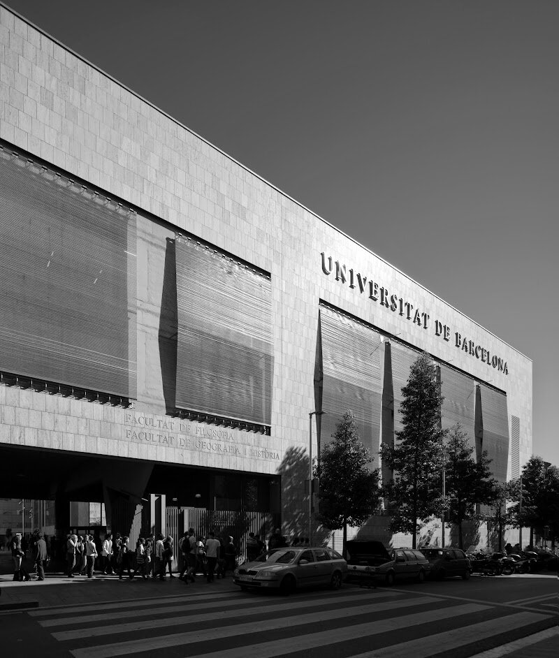 Facultat de Geografia i Història - Universitat de Barcelona - The Facultat de Geografia i Història at the Universitat de Barcelona invites families and curious travelers to explore a vibrant crossroads of the past and present, nestled in the heart of Barcelona’s historic Raval neighborhood. This dynamic faculty, with roots dating back to 1974 and now housed in a modern building since 2006, is where stories of ancient civilizations, artistic masterpieces, and global cultures come alive. What sets this place apart is its unique blend of academic excellence and cultural discovery. As you wander its halls, you’ll sense the energy of nearly 5,000 students and scholars delving into geography, history, art history, anthropology, and archaeology. The faculty’s location is itself part of the adventure—built atop layers of Barcelona’s history, with archaeological work uncovering traces of the city’s evolving landscape. Visitors can experience thought-provoking exhibitions, public lectures, and occasionally even glimpse ongoing research that unravels the mysteries of the past. Whether you’re a family seeking inspiration or a traveler eager to connect with Barcelona’s intellectual soul, the Facultat de Geografia i Història offers a welcoming window into the stories that have shaped the world—and continue to shape the city today.