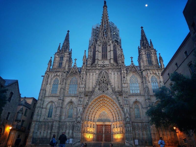 Archdiocese of Barcelona - The **Archdiocese of Barcelona**, centered around the magnificent Barcelona Cathedral (Catedral de la Santa Creu i Santa Eulàlia), is a captivating destination that invites families and curious travelers to step into the heart of the city’s history and spirituality. Rising majestically in the Gothic Quarter, this cathedral is a masterpiece of **Catalan Gothic architecture**, with construction spanning over 150 years from the late 13th century to the 15th century, and a stunning neo-Gothic façade added in the early 20th century. Inside, visitors are greeted by **dramatic vaulted ceilings**, golden pillars, and intricate stone carvings—each detail telling a story of Barcelona’s rich past. Families will especially enjoy the charming cloister, home to thirteen white geese, a living tribute to the young Saint Eulalia, the city’s co-patron saint, whose bravery is woven into local legend. Adventurous guests can climb the octagonal bell tower for sweeping views over the city’s rooftops. Whether marveling at the stained glass windows, discovering hidden chapels, or listening to the grand organ, the Archdiocese of Barcelona offers a journey through centuries of art, devotion, and Catalan heritage, making it a must-see for visitors of all ages.