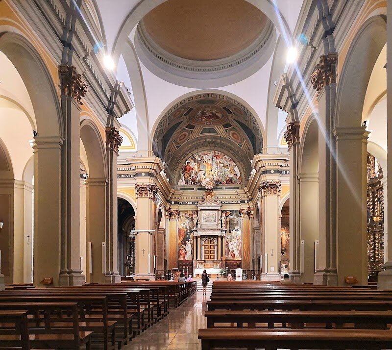 Iglesia de San Vicente de Sarrià - The **Iglesia de San Vicente de Sarrià** is a captivating treasure nestled in Barcelona’s Sarrià district, inviting families and curious travelers to step into centuries of local history and artistry. Originally founded in the 10th century, this church has witnessed the transformation of Sarrià from an independent town to one of Barcelona’s most charming neighborhoods. Its **neoclassical façade**, designed by Josep Mas i Dordal and completed in the early 19th century, greets visitors with elegant pilasters and a striking octagonal bell tower—perfect for budding photographers and history buffs alike. Inside, you’ll discover a single nave flanked by intimate side chapels and a dome crowning the transept, all adorned with works spanning various eras, including a **Baroque altar** dedicated to Our Lady of the Rosary and vibrant mural frescoes. Art lovers will appreciate connections to Catalan heritage, such as the renowned altarpiece by Jaume Huguet, now housed in the National Art Museum of Catalonia. For families, the church’s spacious plaza and welcoming atmosphere make it an ideal spot to pause, reflect, and spark conversations about Barcelona’s rich past. Whether you’re seeking tranquility or inspiration, San Vicente de Sarrià offers a memorable glimpse into the city’s soul.