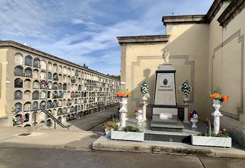 Cementiri del Poblenou - Nestled in Barcelona’s vibrant Poblenou district, **Cementiri del Poblenou** is a hidden gem that invites families and curious travelers to step into a fascinating chapter of the city’s history. Established in 1775 as the first cemetery built outside the medieval walls, it was designed to address the city’s growing population and quickly became an integral part of Barcelona’s social fabric. Strolling through its peaceful avenues, visitors encounter an evocative blend of **neoclassical and modernist architecture**, with grand mausoleums and intricate sculptures that tell stories of love, loss, and legacy. One of the cemetery’s most captivating features is the **“Kiss of Death”** sculpture, a haunting masterpiece that leaves a lasting impression on all who see it. The cemetery is also the resting place of eminent Catalan artists, architects, and everyday citizens, offering a unique window into Barcelona’s diverse cultural heritage. Shaded paths, lush greenery, and symbolic memorials create a tranquil space for reflection, making it ideal for families seeking a contemplative retreat or travelers eager to discover hidden artistic treasures. Visiting Cementiri del Poblenou is more than a walk among tombs—it’s an invitation to connect with the stories and artistry that shaped Barcelona, honoring both its illustrious figures and unsung heroes.