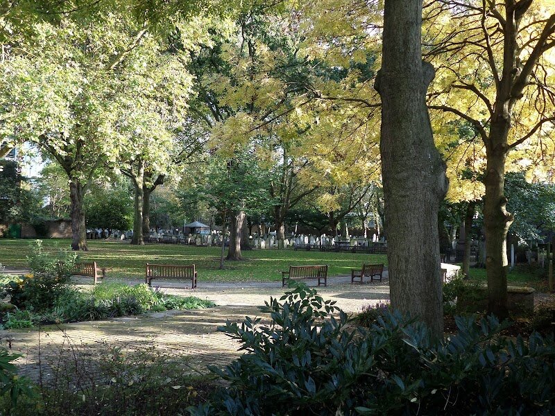 Bunhill Fields Burial Ground - Bunhill Fields Burial Ground is a hidden gem in the heart of London, offering families and curious travelers a peaceful retreat steeped in fascinating history. Once known as "Bone Hill," this atmospheric site began as a hillside piled high with bones from St Paul’s Cathedral in the 16th century, later becoming a sanctuary for those who lived outside the mainstream church. Over 123,000 people found their final resting place here between 1665 and 1854, including some of Britain’s most influential thinkers—like John Bunyan, Daniel Defoe, and William Blake—whose tombs can still be visited today. Strolling through Bunhill Fields, visitors are surrounded by centuries-old monuments and leafy pathways, making it an evocative place to spark young imaginations or enjoy a reflective family walk. The grounds are now a Grade I listed public garden, managed to preserve its tranquil charm amidst the city’s bustle. Whether you’re a history buff, a literary enthusiast, or just seeking a quiet spot to explore, Bunhill Fields invites you to discover stories of nonconformity, resilience, and creativity woven into London’s past.