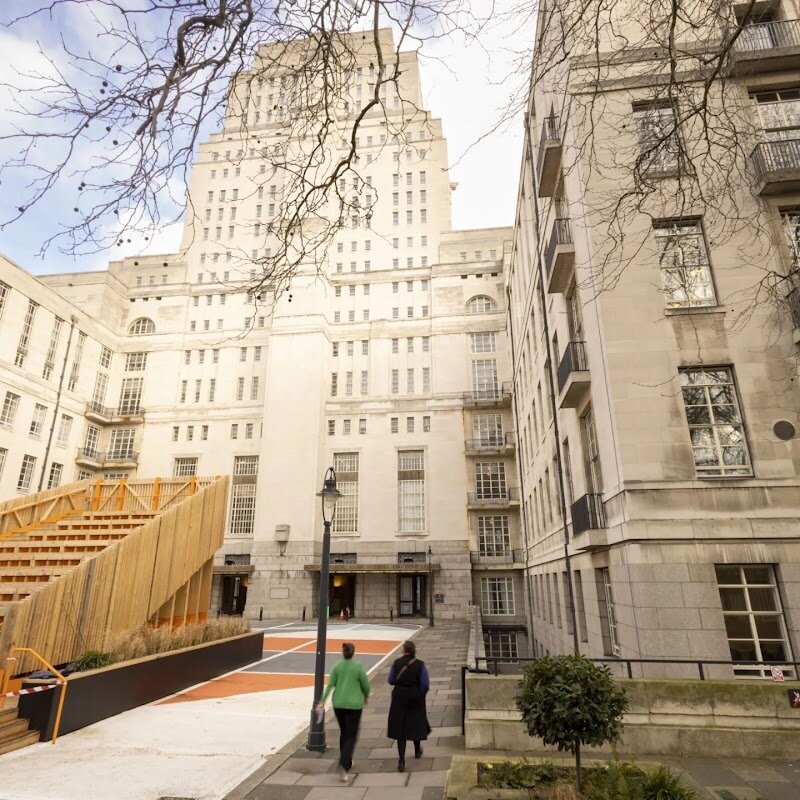 University of London - The University of London stands as a beacon of innovation and inclusivity in the heart of the city, captivating families and curious travelers alike with its remarkable history and vibrant atmosphere. Founded in 1836, it was created as a pioneering alternative to Oxford and Cambridge, opening its doors to students of all backgrounds and faiths—an audacious move that reshaped higher education in England. Today, the university is a unique federation of world-renowned colleges, including University College London and King’s College London, each with its own character and academic excellence. Wander through the elegant Bloomsbury campus and you’ll encounter striking architecture, leafy squares, and centuries-old traditions. Don’t miss the chance to spot the famous auto-icon of philosopher Jeremy Bentham at UCL, a quirky testament to the university’s radical roots. Visitors can explore public exhibitions, art galleries, and cultural events hosted across the colleges, making it an inspiring destination for all ages. Whether you’re drawn by its storied past, its commitment to diversity, or its lively student energy, the University of London offers a fascinating window into the intellectual and cultural life of Britain’s capital.