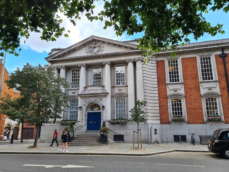 Chelsea Old Town Hall - Chelsea Old Town Hall is a treasure in the heart of London’s Chelsea, captivating families and curious travelers alike with its blend of rich history and timeless elegance. Set along the iconic King’s Road, this striking building dates back to the late 19th century and embodies the grandeur of Victorian and Edwardian architecture, with a stately neoclassical façade and ornate interiors that inspire awe from the moment you arrive. More than just a beautiful landmark, Chelsea Old Town Hall has long been a vibrant hub for the community. Generations have gathered here for everything from lively art exhibitions and bustling antique fairs to joyous family weddings and cultural celebrations. Step inside and you’ll discover the Main Hall, with its soaring vaulted ceiling, glittering chandeliers, stained glass, and murals—a setting that sparks the imagination of visitors young and old. For families, the Town Hall offers a unique glimpse into Chelsea’s storied past and its ongoing role as a meeting place for creativity and connection. Whether you’re exploring with children, attending a fascinating event, or simply marveling at the architecture, Chelsea Old Town Hall invites you to be part of its living history.