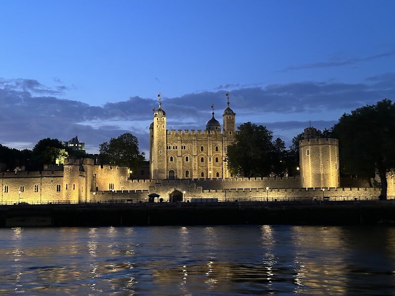 Tower of London - Step into over 900 years of drama, intrigue, and legend at the **Tower of London**, one of the world’s most iconic castles and a true treasure for families and curious travelers alike. Rising majestically on the banks of the Thames, this fortress was begun by William the Conqueror in 1066 and has stood witness to royal triumphs, infamous betrayals, and some of the most pivotal moments in British history. Inside its ancient stone walls, you’ll discover tales of imprisoned queens, daring escapes, and the mysterious fate of the Princes in the Tower. Marvel at the dazzling **Crown Jewels**, still guarded by the famous Yeoman Warders (“Beefeaters”), and meet the legendary ravens, said to protect the very kingdom itself. Children and adults can explore winding passages, imposing towers, and interactive exhibitions that bring the past vividly to life. Whether you’re fascinated by medieval armor, royal secrets, or simply love a good ghost story, the Tower’s mix of history, myth, and spectacle promises a memorable adventure for every visitor.