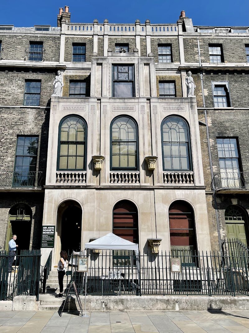 Sir John Soane's Museum - Step into the enchanting world of **Sir John Soane’s Museum**, a hidden gem in the heart of London where history, art, and imagination come alive for visitors of all ages. Once the home of the brilliant Regency architect Sir John Soane, this atmospheric museum is a treasure trove bursting with wonders—from ancient Egyptian relics and medieval sculptures to masterpieces by Turner and Canaletto, all displayed in a labyrinth of beautifully preserved rooms. What makes this place truly special is its sense of discovery: every corridor and chamber reveals unexpected curiosities, ingenious architectural features, and Soane’s playful inventions, like the Picture Room’s secret panels that ingeniously display triple the art in a single space. Families and curious travelers will delight in exploring this “house of marvels,” where Soane’s passion for collecting and storytelling is evident at every turn. The museum’s history is just as fascinating: Soane, determined to share his collection and ideas, secured an Act of Parliament in 1833 to preserve his home exactly as he left it—offering visitors today a rare, time-capsule experience of a great mind and his era. Whether you’re an art lover, aspiring architect, or simply seeking inspiration, Sir John Soane’s Museum promises an unforgettable journey into creativity and curiosity.