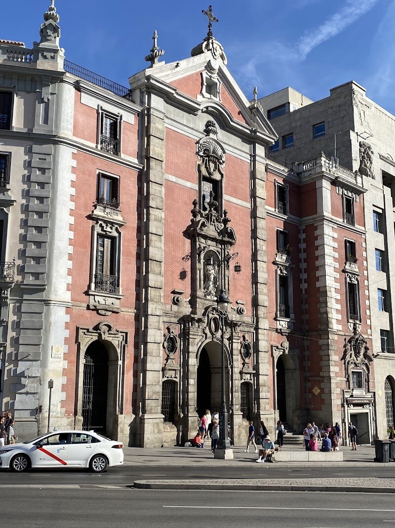 Church of Saint Joseph - Nestled in Madrid's vibrant heart near the iconic Gran Vía, the Church of San José stands as a magnificent testament to Spanish Baroque architecture. Built between 1730 and 1748 under the vision of architect Pedro de Ribera, this stunning structure replaced an earlier 17th-century church that once served the Carmelite community. The moment you approach, the elegant Baroque façade captivates with its distinctive central niche housing an image of Nuestra Señora del Carmen, sculpted by French artist Roberto Michel. Step inside to discover a breathtaking Latin cross layout featuring a soaring central nave flanked by two lateral ones, all crowned by an impressive dome adorned with intricate stucco work. What truly enchants visitors is the rich interior decoration—ornate religious sculptures, graceful semi-circular arches, and beautifully painted ceilings transport you back centuries. The chapel dedicated to Saint Teresa showcases exquisite artwork, while carefully positioned statues in Corinthian style command reverence. Today, the church continues its spiritual mission as an active parish, welcoming both worshippers and curious travelers eager to experience Madrid's religious heritage and architectural splendor.