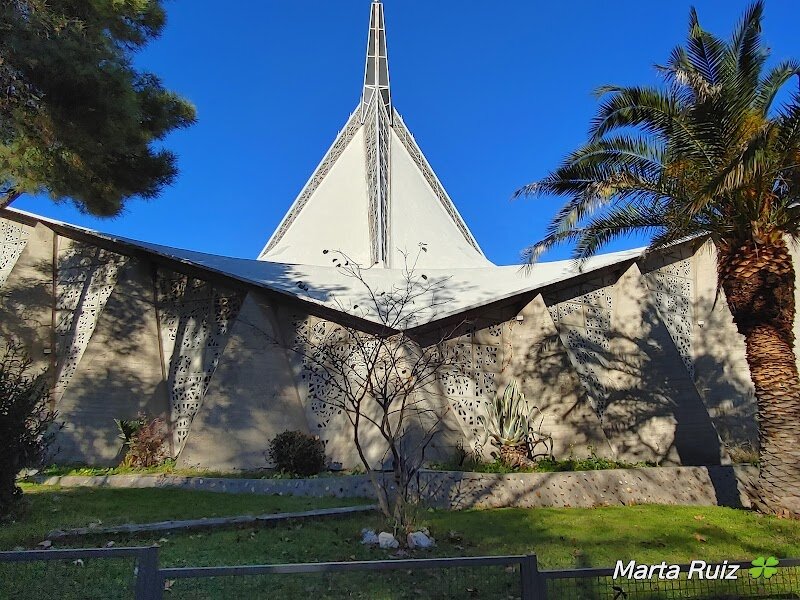 Parish of Our Lady of Guadalupe - # Parish of Our Lady of Guadalupe in Madrid Nestled in the heart of Madrid, the Parish of Nuestra Señora de Guadalupe stands as a modern testament to centuries-old devotion. Built during the 1960s as a collaborative architectural project, this church bridges the gap between Spain's rich religious heritage and contemporary design. This parish holds profound spiritual significance, connecting Madrid's faithful to one of Catholicism's most venerated figures. The church serves as a vibrant community hub where both locals and pilgrims gather to honor Our Lady of Guadalupe, a devotion that has shaped Spanish culture since the Middle Ages. What makes this parish particularly special is its role in the broader Guadalupan tradition—a faith practice that has influenced millions across Spain and the Americas. Visitors discover a space where history, architecture, and spirituality converge, offering an intimate glimpse into Spanish Catholic life. Whether you're a history enthusiast, a spiritual seeker, or simply curious about Madrid's religious landmarks, this parish welcomes you into a living tradition that continues to inspire devotion and community connection in the capital city.
