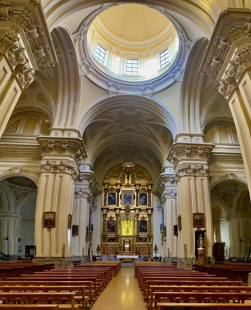 San Cayetano Church - Step into the heart of Madrid’s vibrant Lavapiés district and discover the hidden gem of San Cayetano Church—a place where history, art, and tranquility come together. Built in 1669 and completed in the 18th century, this stunning Baroque church is a masterpiece of craftsmanship, with ornate altars, beautiful frescoes, and a magnificent façade designed by Pedro de Ribera. As you walk through its doors, you’ll be greeted by a peaceful atmosphere that feels worlds away from the bustling city outside. San Cayetano Church is more than just a place of worship—it’s a living part of Madrid’s cultural heritage. Families and curious travelers alike will be captivated by the intricate details, the serene chapels, and the sense of history that fills every corner. Whether you’re admiring the art, reflecting in quiet contemplation, or simply soaking in the local spirit, a visit here offers a unique glimpse into the soul of Madrid. Don’t miss the chance to experience this spiritual jewel and connect with centuries of tradition in one of the city’s most welcoming neighborhoods.