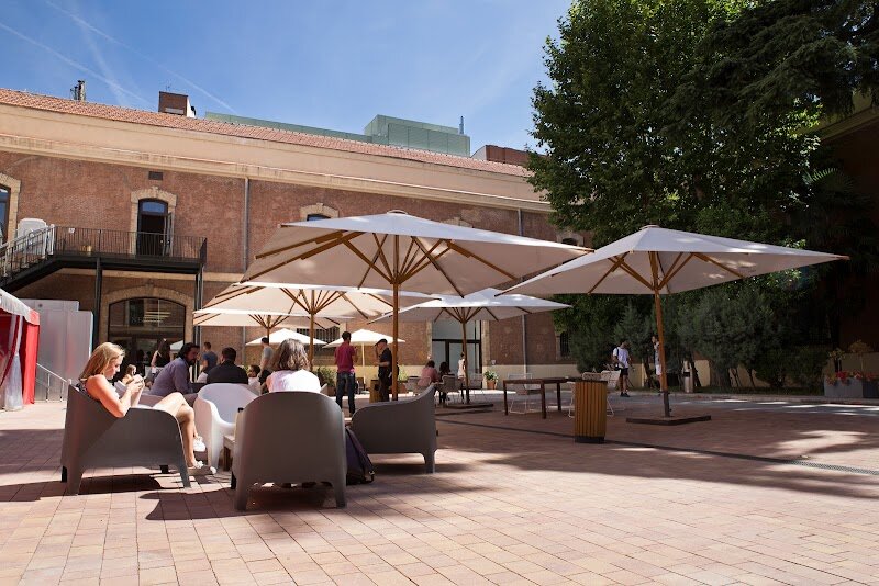 Nebrija University - Nebrija University stands as one of Madrid's most distinctive academic institutions, named after the Renaissance scholar Antonio de Nebrija, who revolutionized European education by creating the first grammar of a modern language in 1492. Founded in 1995, this private university has grown into a medium-sized institution with approximately 9,000 students, blending contemporary innovation with deep historical significance. Located in the heart of Madrid, the university occupies the striking Nebija-Princesa building and maintains additional campuses across the Community of Madrid, including La Berzosa and Dehesa de la Villa. What makes Nebrija truly special is its commitment to interdisciplinary, cutting-edge education across seven schools offering programs in law, engineering, psychology, economics, and more. Visitors and families exploring Madrid's intellectual landscape will find a vibrant hub where centuries of Spanish humanistic tradition meet modern academic excellence. The university's libraries—both traditional and digital—showcase how Nebrija honors its namesake's legacy while embracing technological advancement. Walking through its campuses reveals a living connection to Spain's golden age of scholarship and contemporary European higher education at its finest.