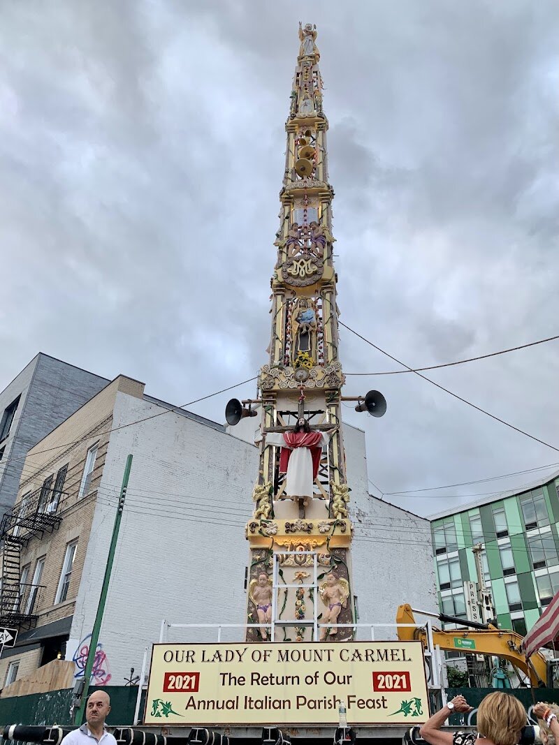 Shrine Church of Our Lady of Mount Carmel - Discover the rich heritage and vibrant spirit of the **Shrine Church of Our Lady of Mount Carmel** in East Harlem—a cherished sanctuary that has welcomed generations of families and travelers since 1884. Born from the devotion of Italian immigrants longing for home, this church was lovingly built by local hands, becoming a symbol of faith, unity, and resilience. Its crowning glory is the revered statue of Our Lady, brought from Italy and formally crowned in 1904 with a golden crown adorned by emeralds sent from Pope Pius X, making it one of the first Marian images crowned outside Europe. Stepping inside, visitors are greeted by a warm, multicultural community and a stunning sacred space alive with tradition. Families and explorers alike can witness the annual summer “Festa”—a joyful feast blending Italian roots with the vibrant diversity of today’s parish, now home to people of all backgrounds. The Shrine’s history is palpable in its art, architecture, and the moving stories of devotion that echo through its halls. Whether you come for quiet reflection, Mass in multiple languages, or to experience a living piece of New York’s immigrant story, this beloved church invites you to be part of something truly special.