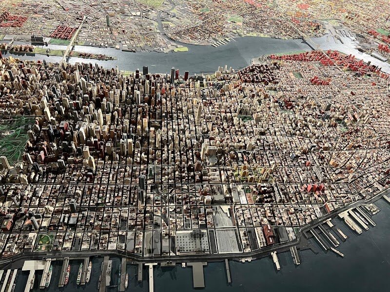 Queens Museum - Nestled in the heart of Flushing Meadows–Corona Park, the Queens Museum is a vibrant hub where New York’s past and present come alive for families and curious travelers alike. Housed in the historic New York City Building—originally constructed for the 1939 World’s Fair and later home to the United Nations General Assembly—the museum is a living testament to the city’s spirit of innovation and diversity. What truly sets the Queens Museum apart is its iconic Panorama of the City of New York, an awe-inspiring, room-sized scale model that captures every street, park, and skyscraper across all five boroughs. Originally built for the 1964 World’s Fair, this 9,335-square-foot marvel delights visitors of all ages, offering a bird’s-eye view of the city’s evolution. Beyond the Panorama, the museum’s engaging exhibits span contemporary art, interactive installations, and fascinating artifacts from both World’s Fairs, inviting families to explore New York’s rich cultural tapestry. With hands-on programs, artist residencies, and ever-changing exhibitions, the Queens Museum is a welcoming space where creativity and history inspire wonder at every turn.