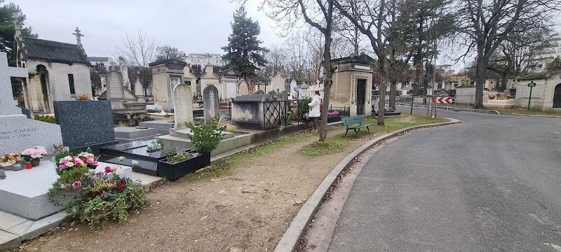 Montparnasse Cemetery - Montparnasse Cemetery, nestled in the heart of Paris’s Left Bank, is a tranquil oasis where history, art, and nature intertwine. Opened in 1824 on former farmland, this 47-acre garden-museum invites families and curious travelers to wander leafy paths shaded by centuries-old trees, discovering the stories of generations past. What sets Montparnasse apart is its remarkable collection of graves belonging to world-renowned writers, artists, and thinkers—among them Simone de Beauvoir, Jean-Paul Sartre, Samuel Beckett, and Susan Sontag. As you stroll, you’ll encounter unique monuments and sculptures, from the whimsical bed-shaped tomb of inventor Charles Pigeon to the evocative Spirit of Eternal Sleep statue. Children and adults alike can marvel at these works of art, while parents share tales of the extraordinary lives laid to rest here. The cemetery’s peaceful atmosphere, dotted with flowers and the occasional windmill, makes it perfect for quiet reflection or a family picnic among history’s greats. Montparnasse Cemetery is more than a burial ground—it’s a living testimony to Paris’s creative soul and a captivating destination for visitors of all ages.