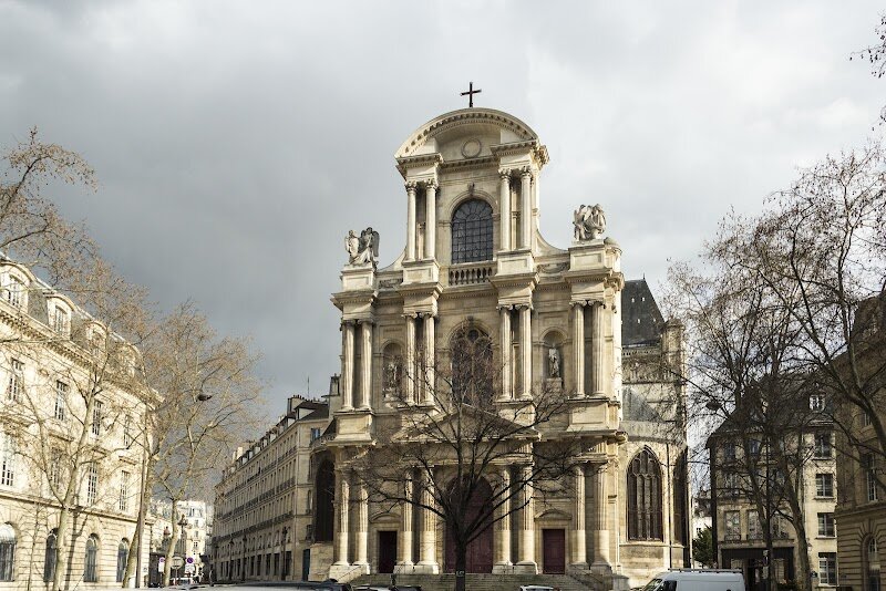 Church of Saint-Gervais - The Church of Saint-Gervais-Saint-Protais in Paris is a hidden gem that invites families and curious travelers to step into centuries of history and artistry. Nestled in the heart of the Marais, this church showcases the evolution of French architecture: its striking three-level Baroque façade—the first of its kind in Paris—features graceful Doric, Ionic, and Corinthian columns, a masterpiece designed by Salomon de Brosse that set the standard for churches across France. Inside, visitors are greeted by a soaring Gothic nave, bathed in colorful light from Renaissance stained glass windows, some dating back to the 16th century. The Chapel of the Virgin is a highlight, adorned with intricate stained glass and 19th-century paintings that captivate children and adults alike. Music lovers will be enchanted by the magnificent organ, one of the oldest in Paris, which has hosted legendary composers such as François Couperin and continues to fill the church with sacred music. As you explore, look for playful carvings of everyday life on ancient choir stalls and marvel at the blend of medieval, Renaissance, and classical styles. Whether you’re seeking history, art, or a moment of peace, Saint-Gervais-Saint-Protais offers a rich and welcoming experience for all ages.