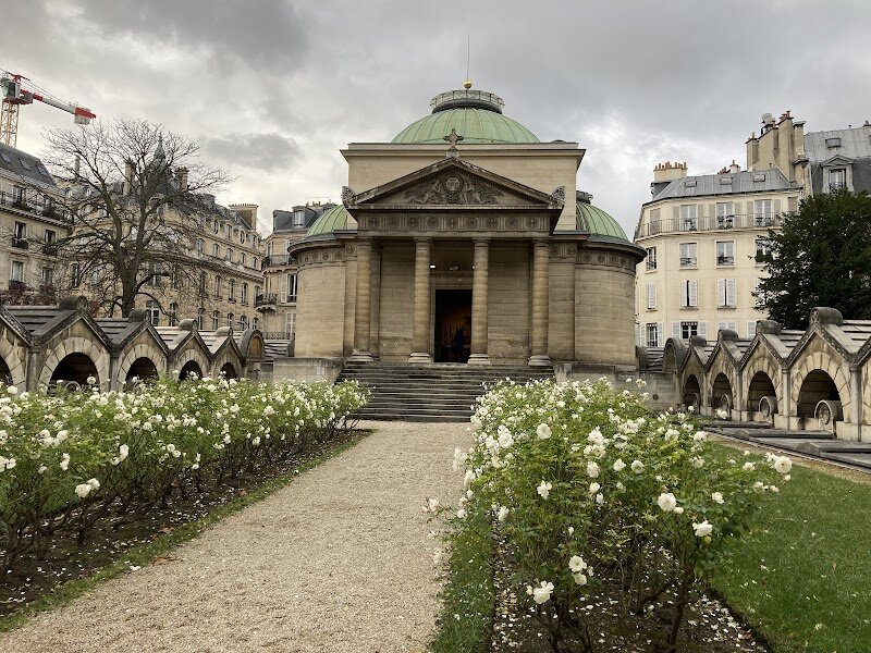 Chapelle expiatoire - Tucked away in a peaceful Parisian garden, the **Chapelle expiatoire** offers families and curious travelers a unique window into France’s dramatic past. This elegant neoclassical chapel was built on the very site where King Louis XVI and Marie Antoinette, after their tragic executions during the French Revolution, were first buried in an unmarked grave. Commissioned in 1816 by Louis XVIII to honor his brother and sister-in-law, the chapel stands as a moving tribute—its name, meaning "expiatory," reflects a desire to make amends for the royal couple’s fate. Inside, visitors can admire graceful statues of Louis XVI and Marie Antoinette, their last words poignantly inscribed at the base, and marvel at the serene beauty of white marble columns, frescoes, and mosaics bathed in natural light. The atmosphere is tranquil, inviting quiet reflection amidst a checkerboard marble floor and evocative sculptures depicting scenes from the royals’ lives. Far less crowded than Paris’s grand monuments, the Chapelle expiatoire is a hidden gem—perfect for families seeking a thoughtful, immersive experience and anyone fascinated by the stories that shaped France.