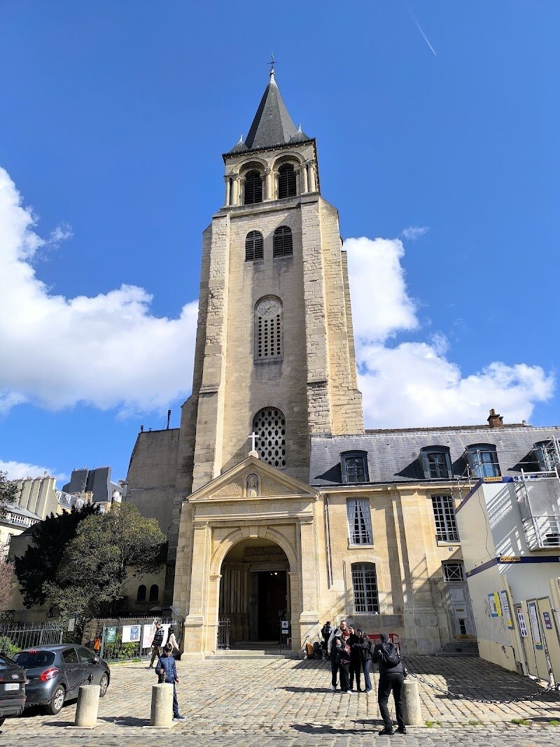 Church of Saint-Germain-des-Prés - Step into the Church of Saint-Germain-des-Prés and you’re entering nearly 1,500 years of Parisian history—a place where ancient stones whisper the city’s secrets. As the **oldest church in Paris**, founded in the 6th century, it once anchored a grand Benedictine abbey and became a final resting place for Merovingian kings, making it a living link to France’s earliest days. Families and curious travelers will be captivated by the church’s blend of **Romanesque architecture**, soaring 11th-century bell tower, and vibrant medieval frescoes. Inside, sunlight dances across centuries-old columns and colorful murals, while outside, the lively Saint-Germain-des-Prés district buzzes with cafés and art galleries—a reminder of the neighborhood’s later fame as a haunt for writers like Sartre and Hemingway. Children can imagine Viking raids or the lives of medieval monks, while music lovers may catch a classical concert in the church’s intimate, resonant nave. Whether you’re drawn by its **architectural beauty**, rich history, or the creative spirit of its surroundings, Saint-Germain-des-Prés is a captivating gateway to Paris’s enduring story.