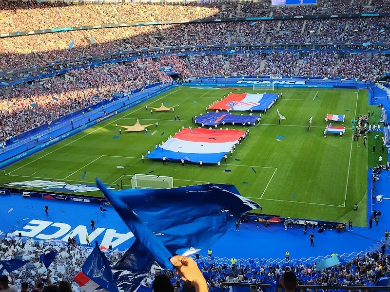Stade de France - Stade de France, nestled in the vibrant suburb of Saint-Denis just north of Paris, is more than a stadium—it's a symbol of national pride and transformation. Built to host the unforgettable 1998 FIFA World Cup, where France’s victory united the country in a wave of joyous celebration, this iconic venue has since become the beating heart of French sport and culture. Its creation marked a turning point for the neighborhood, revitalizing the area and bringing families, fans, and curious travelers together for world-class experiences. Step inside and you’ll discover a place where history was made—where legends like Zidane thrilled crowds, and where the cheers of 81,000 voices echo during electrifying football and rugby matches. But Stade de France is not just for sports lovers; its vast spaces have hosted spectacular concerts, Olympic ceremonies, and family-friendly events that light up the Parisian night. Visitors can explore behind-the-scenes tours, marvel at cutting-edge architecture, and soak up the energy that pulses through the stands. Whether you’re reliving iconic moments or making new memories with loved ones, Stade de France invites every traveler to be part of its ongoing story.