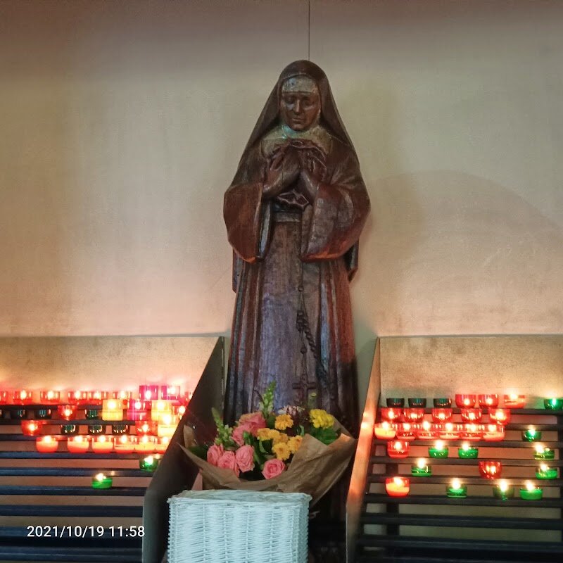 Sainte-Rita Chapel - Tucked away in the lively heart of Paris’s Pigalle district, **Sainte-Rita Chapel** is a hidden gem that invites visitors of all ages to discover a story of hope and resilience. Founded in 1956, this unique chapel is dedicated to **Saint Rita of Cascia**, known as the patron saint of lost causes, and was originally built to serve the marginalized communities of the area, especially the women working in Pigalle’s red-light district. What sets Sainte-Rita apart is its welcoming atmosphere and its mission of compassion—a spirit that continues today, making it an uplifting stop for families and curious travelers seeking more than the typical tourist sites. Inside, you’ll find a tranquil, light-filled sanctuary, where modern stained glass windows cast colorful reflections across the simple yet inviting interior. The chapel’s history is woven into the fabric of Paris’s social life, offering a rare glimpse into the city’s efforts to provide dignity and support to those in need. Visitors can pause for a moment of reflection, admire the contemporary religious art, and feel the enduring message of hope that Sainte-Rita Chapel has shared for generations.