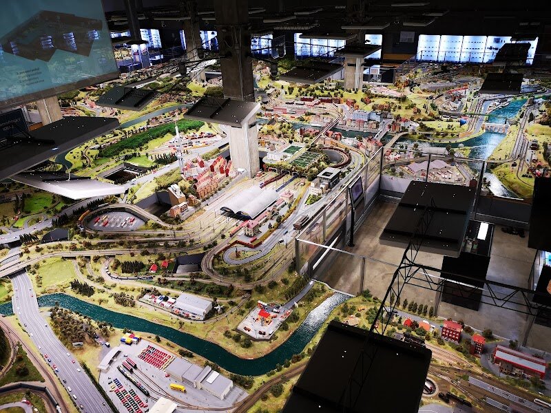 Království Železnic - Step into the enchanting world of **Království Železnic**—the Kingdom of Railways—where Prague’s love affair with trains comes to life in miniature. Opened in 2009, this immersive museum delights families and curious travelers alike with its sprawling, meticulously crafted model railways, all set in the heart of the city’s vibrant Anděl district. Here, the **history of Czech railways** unfolds across two expansive underground floors, where tiny trains wind through detailed landscapes that mirror real Czech towns, rolling countryside, and iconic landmarks. What makes Království Železnic truly special is its blend of *education and play*. Kids and adults can operate trains, press buttons to animate scenes, and even ride on miniature trains, making every visit hands-on and memorable. The exhibits go beyond static displays—watch as bustling stations come alive, urban trams glide through mini Prague, and trains traverse rivers and forests, all accompanied by the authentic sounds of rail travel. Whether you’re a railway enthusiast or just looking for a magical day out, you’ll find inspiration here. The museum’s evolving displays and interactive features ensure that every visit offers new discoveries, sparking imaginations and creating lasting memories for visitors of all ages.