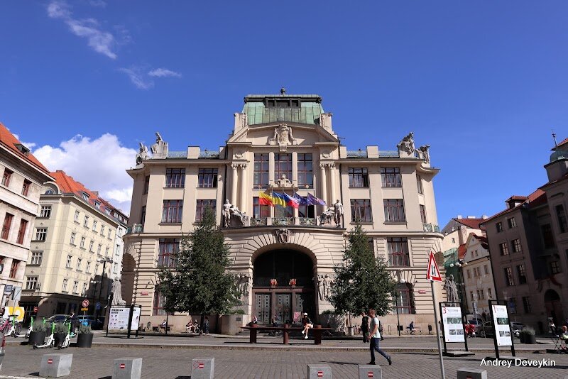 Prague New City Hall - Prague’s New City Hall, or **Nová radnice**, is a striking fusion of history, artistry, and civic pride right in the heart of Old Town. Built between 1908 and 1912, this impressive building was designed by Osvald Polívka to echo the grandeur of Prague’s baroque surroundings while embracing the elegance of Art Nouveau. Once simply the city’s finance office, it became the official seat of Prague’s mayor and city council after World War II, making it a living symbol of the city’s resilience and governance. What truly sets New City Hall apart is its **artistic detail**—look for the expressive statues and bas-reliefs by renowned Czech sculptors, including allegories of labor and legendary local figures like Rabbi Loew and the Iron Knight, which are sure to spark children’s imaginations. Families and curious travelers will love exploring the grand halls, adorned with sparkling chandeliers and intricate ironwork, and experiencing the famous *paternoster lift*—a rare, continuously moving elevator that feels straight out of a storybook. Inside, visitors often find exhibitions that bring Prague’s vibrant history and culture to life, while outside, the picturesque square and nearby winding streets invite exploration. The New City Hall offers a unique window into Prague’s past and present—a must-see for anyone eager to discover the city’s hidden stories and architectural wonders.