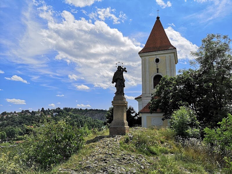 Kostel svatého Filipa a Jakuba - Kostel svatého Filipa a Jakuba in Prague is a captivating blend of history and artistry, inviting families and curious travelers to discover its unique story. Originally constructed as a Romanesque church in the 12th century, it was lovingly rebuilt in 1894 in the neo-Romanesque style, drawing on materials and stunning sculptures from its predecessor. The church’s tall steeple, with its three floors and elegant spire, stands as a proud landmark in the Malvazinky district, its facade adorned with baroque statues and intricate architectural details that will fascinate both adults and children. Stepping inside, visitors are greeted by a tranquil atmosphere, where echoes of centuries past blend with the beauty of restored artistry. Families can marvel at the baroque Messiah statue and the original works of Ferdinand Maxmilián Brokof, while the church’s peaceful surroundings offer a gentle reprieve from the city’s bustle. With its rich historical roots—once the spiritual heart of Smíchov and now a testament to Prague’s evolving story—Kostel svatého Filipa a Jakuba promises an inspiring experience for anyone eager to explore Prague’s hidden gems and heritage.