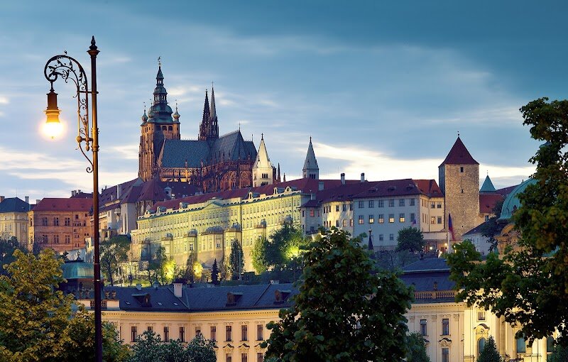 Lobkowicz Palace - Lobkowicz Palace, nestled within the iconic Prague Castle complex, is a treasure trove of art, music, and family history that invites curious travelers and families to step into the heart of Bohemian heritage. Built in the 16th century, this remarkable palace is the only privately owned building in the castle grounds and has witnessed pivotal moments in Czech history—most famously, sheltering Catholic ministers after the dramatic Defenestration of Prague in 1618, a spark that ignited the Thirty Years’ War. What sets Lobkowicz Palace apart is the personal touch of the Lobkowicz family, who reclaimed their ancestral home after decades of confiscation by Nazi and Communist regimes. Visitors can explore one of Europe’s finest private art collections, with masterpieces by Bruegel, Canaletto, and Velázquez, rare musical manuscripts by Beethoven and Mozart, and centuries-old ceramics and armor. Engaging audio guides, narrated by family members, bring the stories to life, making it easy for all ages to connect with the palace’s rich past. The palace also delights with panoramic city views, a family-friendly café, and daily classical music concerts—making it a magical, memorable stop for anyone eager to experience Prague’s cultural legacy firsthand.
