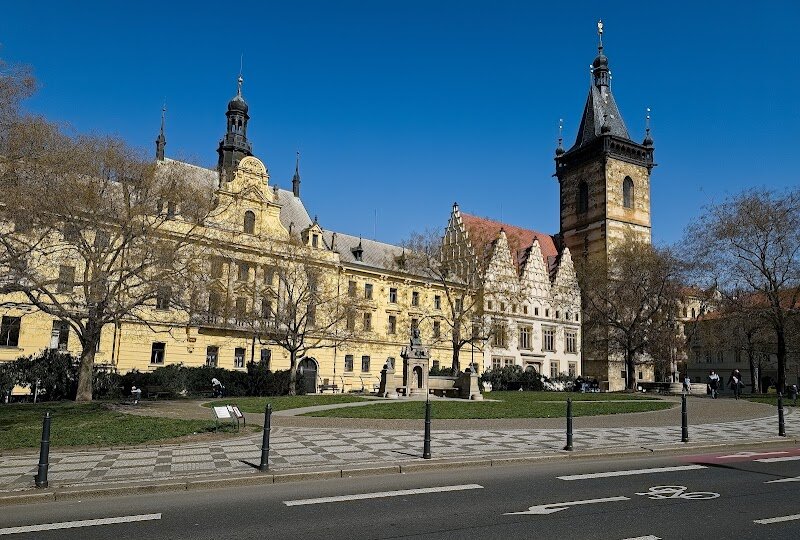 New Town Hall - Step into history at Prague’s **New Town Hall**, a captivating Gothic landmark that has witnessed centuries of dramatic events and transformation. Built in the late 14th century as the heart of the dynamic “New Town,” the hall became the stage for one of Prague’s most infamous episodes: the first defenestration of 1419, where angry Hussite supporters hurled Catholic councillors from the windows, sparking the Hussite Wars. Families and curious travelers will find much to explore here. Wander through atmospheric halls that once echoed with the debates and intrigues of medieval city officials. Marvel at the restored Gothic-Renaissance architecture, shaped by renowned architects like Benedikt Ried and Kamil Hilbert, whose work also graces Prague Castle. Climb the tower for a breathtaking, lesser-known view over Prague’s historic skyline—a treat for both kids and adults. Today, New Town Hall buzzes with life, hosting exhibitions, cultural events, and even a trendy café nestled within its ancient walls. It’s a living monument where Prague’s past and present meet, inviting visitors of all ages to experience stories, secrets, and spectacular city views.
