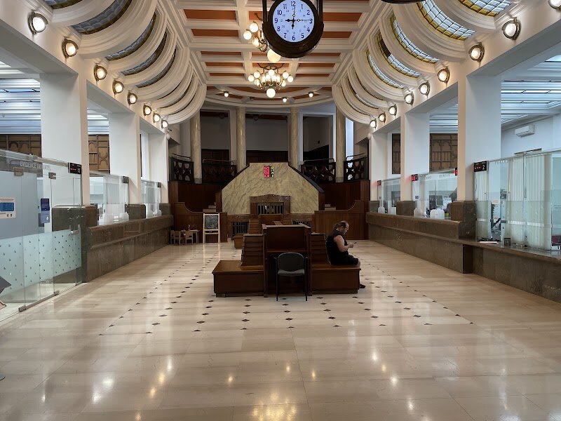 Praha 2 - Úřad městské části - odd. Osobních dokladů a Ověřování - Praha 2’s Úřad městské části – oddělení Osobních dokladů a Ověřování sits at the heart of one of Prague’s most storied and vibrant districts, where history and daily life intertwine. Nestled among the elegant boulevards of Vinohrady and the historic streets of Nové Město, this municipal office is more than a place for official documents—it’s a gateway to the living heritage of Prague 2. Families and travelers who venture here will find themselves surrounded by echoes of the city’s dramatic past, from the medieval foundations of Charles IV’s New Town to the 20th-century transformations that shaped modern Prague. The district itself is a tapestry of architectural gems, leafy parks, and bustling local cafés, inviting visitors to linger and explore. Step inside the office and you’ll experience the city’s renowned efficiency and hospitality, where locals and newcomers alike are welcomed as part of the Prague community. Whether you’re seeking to glimpse the everyday rhythms of Czech life or simply marvel at the centuries of history embedded in every street, a visit to this municipal office offers a unique, authentic slice of Prague—where the city’s past and present meet.