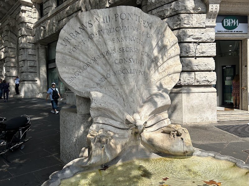 Fountain of the Bees - Nestled in the heart of Rome, the enchanting Fountain of the Bees is a masterpiece of Baroque architecture, crafted by the renowned Gian Lorenzo Bernini in 1644. Commissioned by Pope Urban VIII, this charming fountain honors the Barberini family, whose emblem features three bees, symbolizing industriousness and productivity. The fountain's design is a harmonious blend of natural elements and artistic craftsmanship, with bronze bees and intricate carvings that showcase Bernini's genius. Located in the vibrant Piazza Barberini, this hidden gem offers a serene ambiance, perfect for families and curious travelers alike. Visitors can marvel at the fountain's beauty while exploring the surrounding historical landmarks, such as the Palazzo Barberini. As you stroll through the piazza, the soothing sounds of water and the vibrant atmosphere will captivate your senses. The Fountain of the Bees is not just a work of art; it's a testament to Rome's rich cultural heritage, inviting you to step into its timeless beauty and history.