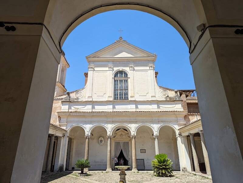 Basilica of San Clemente - Nestled just a short walk from the Colosseum, the Basilica of San Clemente is a mesmerizing journey through time, offering families and curious travelers a unique glimpse into Rome’s layered past. What appears at first as a typical Roman church reveals itself as a three-tiered archaeological marvel: the current 12th-century basilica sits atop a 4th-century church, which in turn was built over a 1st-century Roman nobleman’s home—and even deeper, the ruins of a 2nd-century Mithraic temple lurk below. This extraordinary vertical excavation lets you literally walk through nearly 2,000 years of history, from pagan rituals to early Christian worship and medieval artistry. Inside the upper basilica, sunlight dances across the glittering 12th-century apse mosaic, while the intricate Cosmatesque marble floor and beautifully preserved choir stalls whisper of medieval craftsmanship. Descend to the lower church, and you’ll find yourself surrounded by fading frescoes and the echoes of ancient councils. Venture even deeper, and the air grows cool as you wander past Roman brickwork, hear the rush of an ancient sewer, and stand before the altar of Mithras, where secret rites once took place. San Clemente is more than a church—it’s a living museum, perfect for sparking the imagination of both young and old. Whether you’re drawn by art, history, or the thrill of discovery, this hidden gem invites you to uncover the stories buried beneath Rome’s bustling streets.