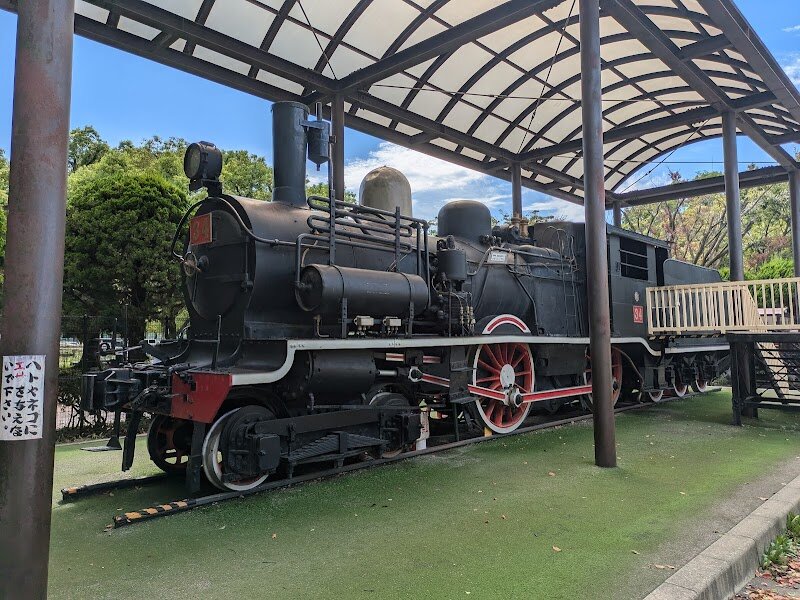 Haginaka Park - Haginaka Park in Tokyo’s Ota Ward is a delightful oasis designed with families and curious travelers in mind, blending playful adventure with local culture. What sets Haginaka Park apart is its unique *traffic rules park* concept: children can pedal along miniature roads, complete with real traffic lights, learning the basics of road safety in a fun, hands-on way. The heart of the park is “Garakuta Junk Park,” a wonderland featuring real train carriages, fire engines, pickup trucks, speedboats, and even a miniaturized space shuttle jungle gym—perfect for sparking young imaginations. Beyond this, sprawling open lawns, vibrant jungle gyms, and standard playgrounds offer endless opportunities for energetic play. Sports lovers will find baseball fields and an indoor swimming pool, while nature enthusiasts can enjoy seasonal cherry and plum blossoms that brighten the landscape. Steeped in the historical context of Ota Ward—a region with a rich heritage as a former farming and fishing hub and later a gateway between old Edo and modern Tokyo—Haginaka Park reflects the community’s spirit of innovation and togetherness. For families seeking a memorable outing or travelers eager to experience local life, Haginaka Park promises discovery, laughter, and a genuine slice of Tokyo’s vibrant neighborhood charm.