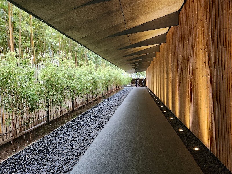 Nezu Museum - Nestled amid the chic streets of Aoyama, the **Nezu Museum** is a hidden oasis that invites families and curious travelers to explore the heart of Japanese artistry and nature. Established in 1941 to showcase the remarkable collection of Nezu Kaichirō—a visionary businessman and passionate art lover—the museum holds over 7,000 treasures spanning **pre-modern Japanese and East Asian art**. Step inside the strikingly modern building, redesigned by renowned architect Kengo Kuma, and wander through airy galleries featuring ancient calligraphy, exquisite ceramics, samurai armor, and even a certified national treasure from the 8th century. But the experience doesn’t end with art. Beyond the galleries, a lush Japanese garden unfurls, dotted with teahouses and winding paths—perfect for children to roam and families to relax together. The museum’s tranquil setting and hands-on tea culture displays offer a peaceful retreat from the city’s buzz, making it a favorite for both locals and visitors. Whether you’re marveling at centuries-old masterpieces or strolling beneath bamboo and maple trees, the Nezu Museum promises an inspiring journey through history, creativity, and serenity.