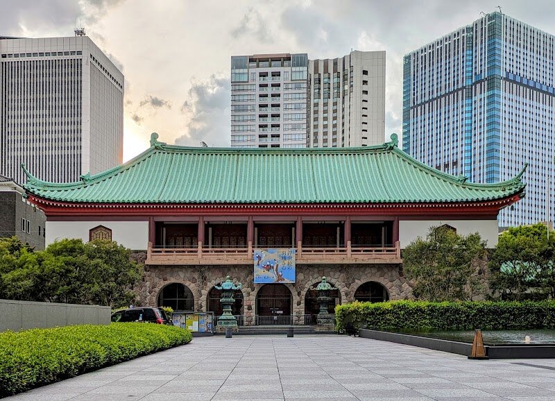 Okura Museum of Art - Step into a world where history and artistry intertwine at the **Okura Museum of Art**, Tokyo’s oldest private art museum and a hidden gem for families and curious travelers alike. Founded in 1917 by visionary industrialist Ōkura Kihachirō to safeguard Japan’s cultural treasures, the museum itself is a piece of history—rebuilt after the 1923 Great Kantō earthquake in a striking classical Chinese style that sparks the imagination of visitors of all ages. Inside, you’ll discover a rotating selection from a collection of over 2,500 masterpieces, including three National Treasures and twelve Important Cultural Properties—think ancient Buddhist sculptures, delicate calligraphy, and vibrant paintings spanning centuries of Japanese and East Asian heritage. Kids and adults alike will marvel at details like the dragon carved into the exhibition room’s ceiling and the whimsical mythical creatures adorning the pillars. Don’t miss the tranquil garden, where monuments and poetry offer a peaceful retreat and a glimpse into the life of the museum’s founder. Whether you’re an art lover or a family seeking inspiration, the Okura Museum of Art promises a journey through time, culture, and creativity—right in the heart of bustling Tokyo.