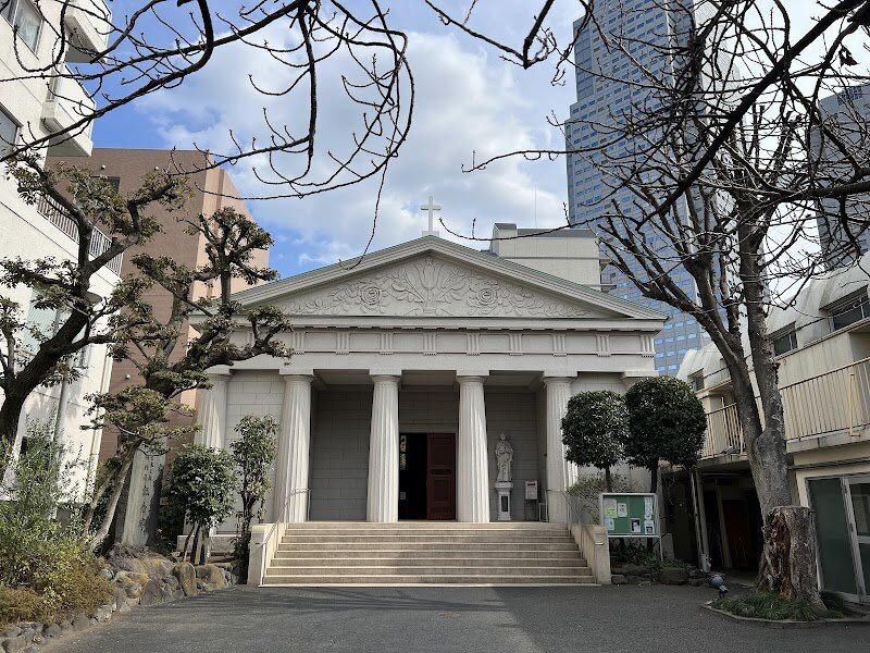 Old Cathedral of St. Joseph - Step into the heart of Tokyo’s storied past at the **Old Cathedral of St. Joseph**, a place where history, faith, and architectural beauty come together in a truly memorable experience for families and curious travelers alike. As the **first Catholic church in Tokyo**, founded in 1874 by French missionaries, this remarkable landmark stands as a testament to resilience—rebuilt after the devastating 1923 Great Kantō earthquake and lovingly maintained for generations. Modelled after La Madeleine in Paris, the cathedral’s **neoclassical facade**, with its six imposing Doric columns and gable carved with lilies and roses, immediately captures the imagination. Inside, visitors can sense the spirit of hope that carried early Christians through times when practicing their faith was forbidden in Japan. Today, the tranquil atmosphere invites families to reflect, discover centuries-old traditions, and admire the artistry that fills the space. Whether you’re drawn by its 150 years of history, its unique European-inspired design, or the stories of perseverance and community, the Old Cathedral of St. Joseph offers an inspiring glimpse into Tokyo’s multicultural heritage—an enriching stop for explorers of all ages.
