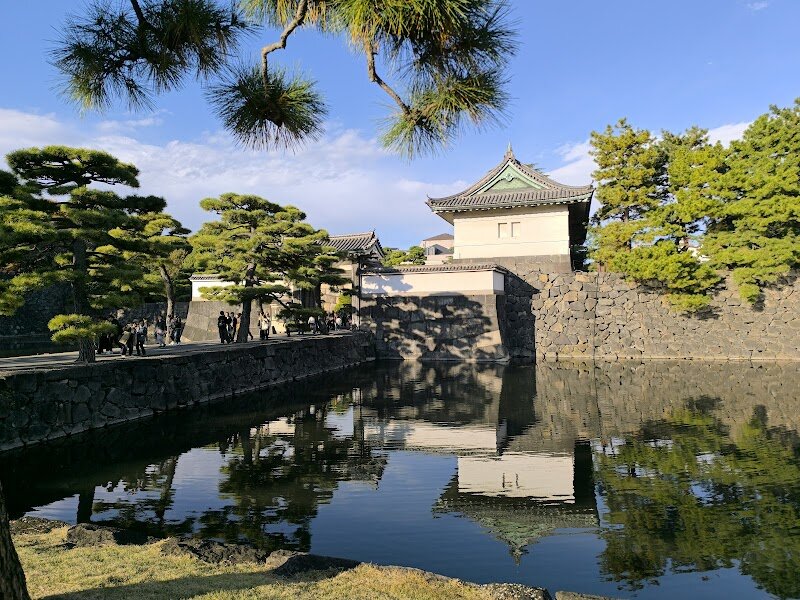Kikyō-mon Gate - Kikyō-mon Gate is a captivating portal into Japan’s imperial history, set amid the tranquil gardens of Tokyo’s Imperial Palace. As you approach, the gate’s sturdy wooden beams and stone base—dating back to the Edo period—immediately evoke the craftsmanship of a bygone era, making it a standout for both young explorers and history-loving parents. The gate’s name, meaning “Wisteria Gate,” hints at the lush, flower-filled surroundings that burst into color each spring, creating a magical backdrop for family photos and leisurely strolls. Once a key entrance to Edo Castle, Kikyō-mon has witnessed centuries of samurai, shoguns, and royal processions. Today, it serves as a serene starting point for official palace tours, or simply a peaceful spot to reflect and imagine the stories these stones could tell. Children can marvel at the imposing architecture, while adults appreciate the gate’s connection to legends and the mystery behind its name—possibly linked to the crest of the castle’s original builder. Whether you’re snapping photos, wandering the gardens, or soaking up centuries of history, Kikyō-mon Gate offers families and curious travelers an inspiring journey into the heart of Tokyo’s heritage.