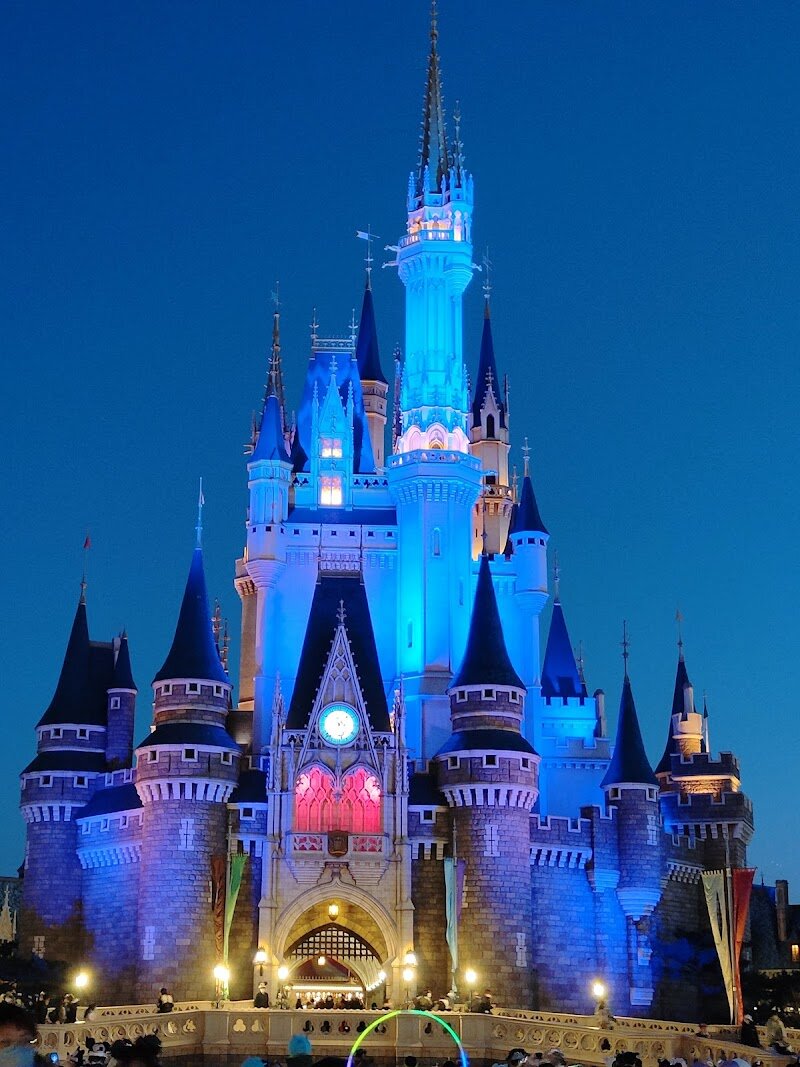 Tokyo Disneyland - Tokyo Disneyland is a dazzling fusion of Japanese hospitality and classic Disney magic, offering families and travelers a truly enchanting escape in the heart of Japan. Opened in 1983 as the first Disney theme park outside the United States, it stands apart for its unique ownership by the Oriental Land Company, giving it a distinct local character while still delivering beloved Disney experiences. Stepping into the park, guests are greeted by the iconic World Bazaar—a grand, Victorian-inspired arcade with a glass roof, designed to protect visitors from Tokyo’s unpredictable weather and set the stage for a day of wonder. The park unfolds into themed lands filled with timeless attractions, spectacular parades, and meticulously crafted details that delight guests of all ages. What makes Tokyo Disneyland especially memorable is its reputation for exceptional service, immersive storytelling, and a joyful atmosphere that feels both familiar and refreshingly new. From the majestic Cinderella Castle to exclusive seasonal events, every visit promises new surprises and magical moments. Tokyo Disneyland is more than a theme park—it’s a cherished destination where dreams come alive for families and curious travelers alike.