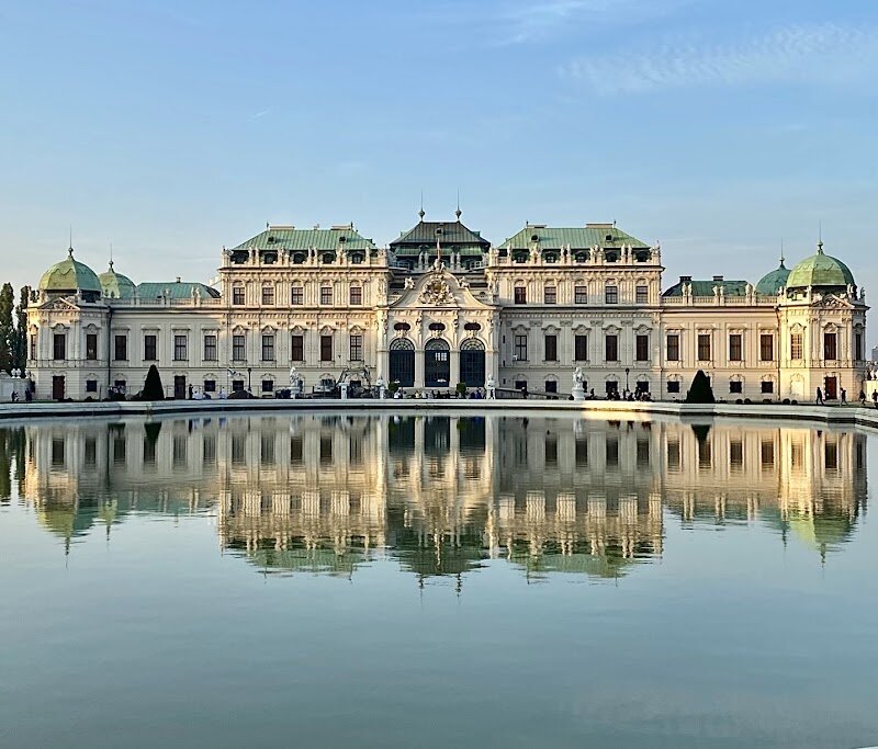 Belvedere Palace - Belvedere Palace stands as one of Vienna's most magnificent treasures, a stunning Baroque masterpiece that captures the grandeur of 18th-century Austria. Built between 1712 and 1723 by Prince Eugene of Savoy, this architectural gem was designed by the brilliant Johann Lukas von Hildebrandt and originally served as the prince's lavish summer residence. What makes Belvedere truly special is its dual nature—two interconnected palaces separated by breathtaking gardens adorned with sculptures and fountains. The Lower Belvedere once housed the prince's personal quarters, while the Upper Belvedere was conceived as a ceremonial showcase of power and prestige. Today, both buildings have been transformed into world-class museums displaying an extraordinary collection of Austrian art spanning 900 years. Visitors can marvel at iconic masterpieces, including Gustav Klimt's famous "The Kiss," alongside works by other celebrated artists. Beyond the paintings and sculptures, the palace itself enchants with ornate facades, grand staircases, and intricate frescoes that exemplify Baroque opulence. Whether you're an art enthusiast, history lover, or simply seeking beauty, Belvedere Palace offers an unforgettable journey through Austria's cultural heritage and artistic legacy.