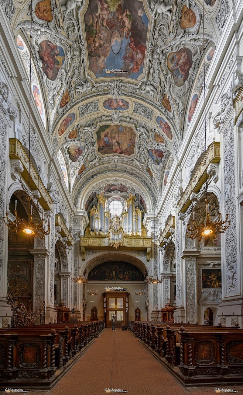 Basilika Maria Rotunda (Dominikanerkirche) - The Basilika Maria Rotunda, known as the Dominikanerkirche or Dominican Church, is a captivating early Baroque gem nestled in Vienna’s historic center. This stunning church, built between 1631 and 1634 under the patronage of Emperor Ferdinand II, showcases exquisite Italian Baroque architecture crafted by master builders Spacio, Biasino, and Canevale. Its barrel-vaulted ceiling dazzles with Matthias Rauchmiller’s frescoes depicting 46 scenes from the life of the Virgin Mary, creating a vibrant, immersive experience for visitors. What makes this basilica truly special is its rich history: it stands as the third church on this site, originally established by the Dominicans in 1237. The site has witnessed transformations from Romanesque to Gothic styles before embracing the Baroque splendor seen today. Families and curious travelers alike will be enchanted by the six side chapels dedicated to saints such as St. Catherine of Siena and Thomas Aquinas, each adorned with beautiful paintings that invite reflection and storytelling. Visiting the Basilika Maria Rotunda offers a journey through centuries of faith, art, and architecture—a place where history breathes through every fresco and stone, inspiring wonder and discovery for all ages.