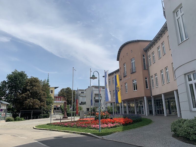 Stadtgemeinde Schwechat - Nestled just outside the vibrant heart of Vienna, Stadtgemeinde Schwechat is a charming blend of history, culture, and modern convenience that’s perfect for families and curious travelers alike. While best known as the home of Vienna International Airport, Schwechat offers much more than a transit stop—it’s a gateway to authentic Austrian life with a story all its own. Step into the past at the Eisenbahnmuseum Schwechat, where vintage trains tell tales of a bygone era, or wander the elegant grounds of Schloss Altkettenhof, a historic castle that whispers secrets of noble families and centuries gone by. For those who love a panoramic view, the Visitor Terrace provides a unique vantage point to watch planes glide in and out, a favorite with kids and aviation enthusiasts. Schwechat’s proximity to Vienna means world-famous attractions like Schönbrunn Palace and the State Opera are just a short journey away, but here you’ll also discover local markets, green spaces, and a warm, welcoming atmosphere. Whether you’re tracing history, enjoying a family outing, or simply soaking up the local vibe, Schwechat offers a delightful taste of Austria that’s both accessible and unforgettable.